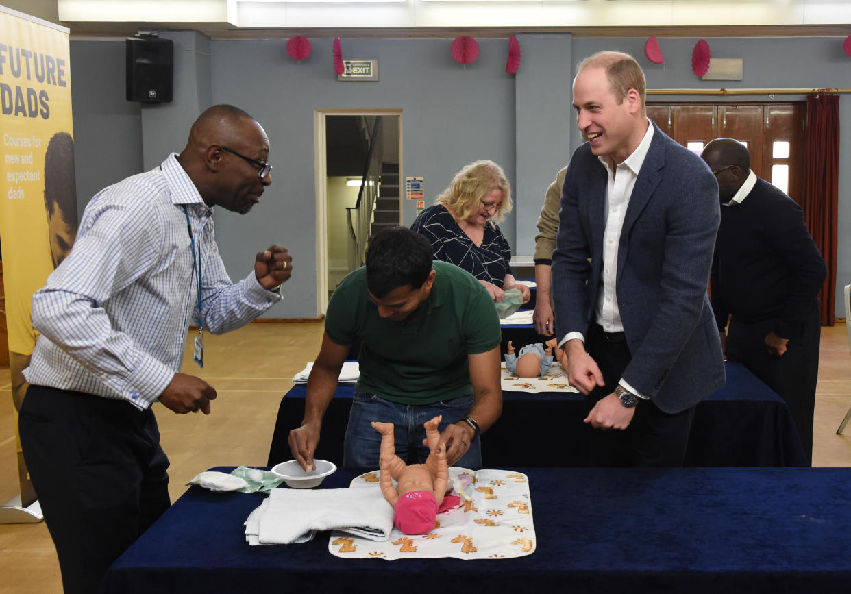 William observes a nappy-changing session [Photo: PA]