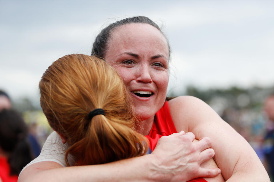 This picture shows Daisy Pearce choking back tears after Melbourne's AFLW grand final win.