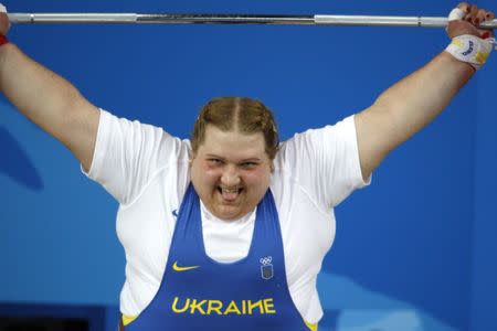 Olha Korobka of Ukraine competes in the women's +75kg Group A weightlifting competition at the Beijing 2008 Olympic Games, August 16, 2008. REUTERS/Yves Herman