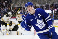 Toronto Maple Leafs' Mitchell Marner (16) celebrates his goal against Boston Bruins goaltender Linus Ullmark (35) during the second period of an NHL hockey game, Wednesday, Feb.1, 2023 in Toronto. (Frank Gunn/The Canadian Press via AP)