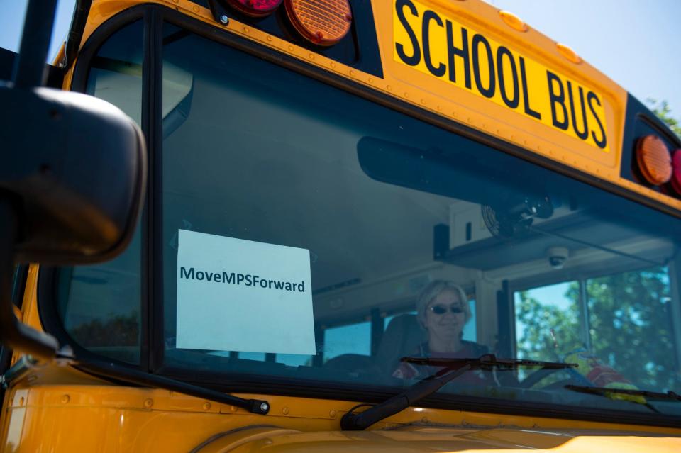 Bus driver Wanda Galdwell sits in her bus offering free WIFI for students at a Marathon gas station on Union Academy Road and AL-94 in Montgomery, Ala., on Wednesday, April 15, 2020. 