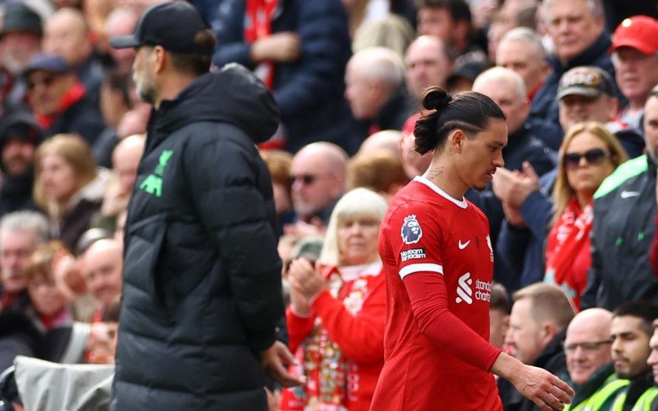 Darwin Nunez walks past manager Jurgen Klopp after being substituted