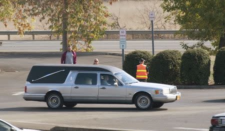 A hearse arrives at the funeral service of Umpqua Community College student Jason Johnson in Roseburg, Oregon October 8, 2015. REUTERS/Amanda Loman