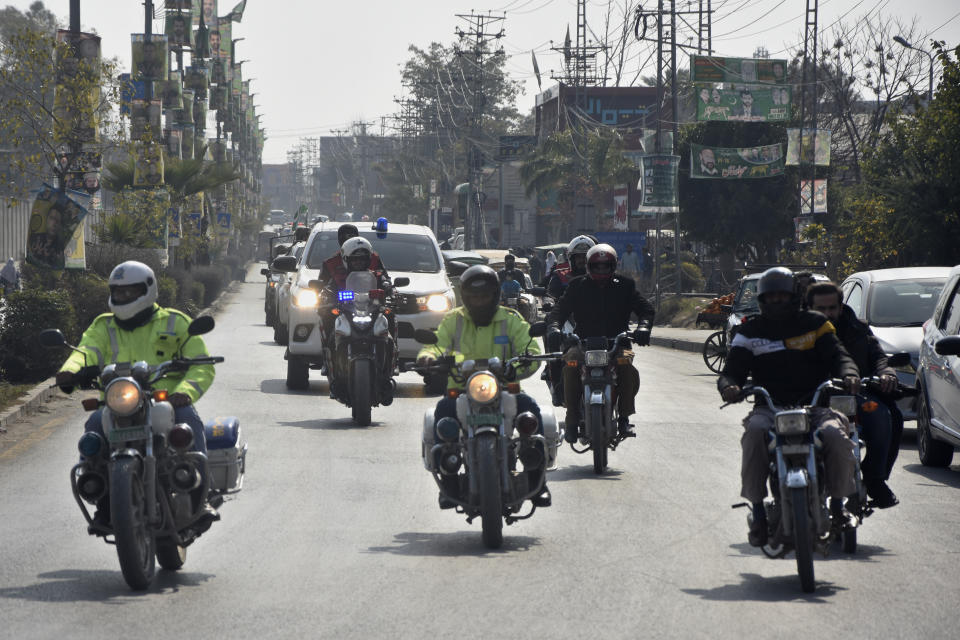 A convoy of security forces patrol in city areas to ensure security ahead of Feb. 8 general elections, in Rawalpindi, Pakistan, Monday, Feb. 5, 2024. Pakistan is holding parliamentary election this week but many voters are disillusioned and wonder if the balloting can bring any real change in a country mired in political feuding, a seemingly intractable economic crisis and a resurgent militancy. (AP Photo/W. K. Yousufzai)