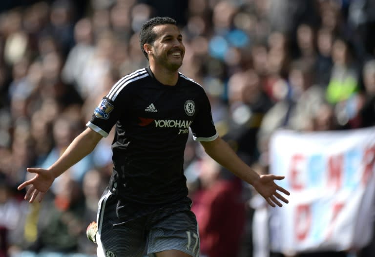 Chelsea's midfielder Pedro celebrates after scoring a goal during the English Premier League football match between Aston Villa and Chelsea at Villa Park in Birmingham, England on April 2, 2016