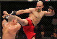 BELO HORIZONTE, BRAZIL - JUNE 23: (R-L) Thiago "Bodao" Perpetuo kicks Leonardo Mafra during their UFC 147 middleweight bout at Estadio Jornalista Felipe Drummond on June 23, 2012 in Belo Horizonte, Brazil.