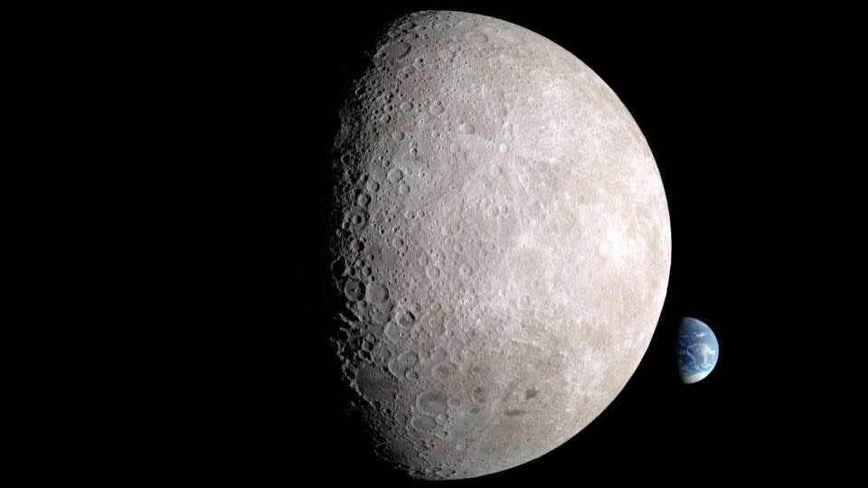 An illustration shows the far side of the moon, with Earth behind it.  -NASA