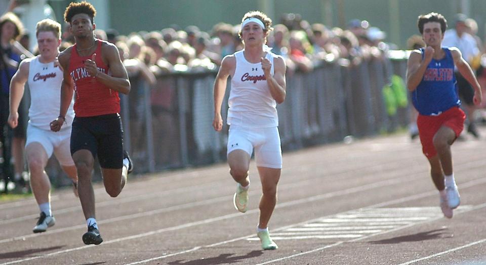 Wade Bolin, Caiden Allen, Adison Reymer and Scotty Hickey run the 100 meters during the Firelands Conference Championships at New London Friday, May 13, 2022.