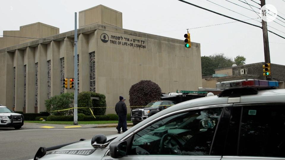 Officers work the scene of a mass shooting in 2018 at the Tree of Life synagogue in Pittsburgh, Pennsylvania.