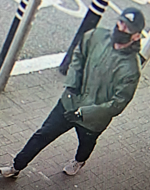 Police have launched an investigation into the armed robbery, which saw around £28,500 in cash taken from a security guard. (Greater Manchester Police) 