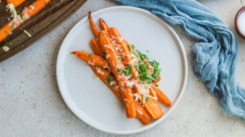 Roasted carrots on white plate