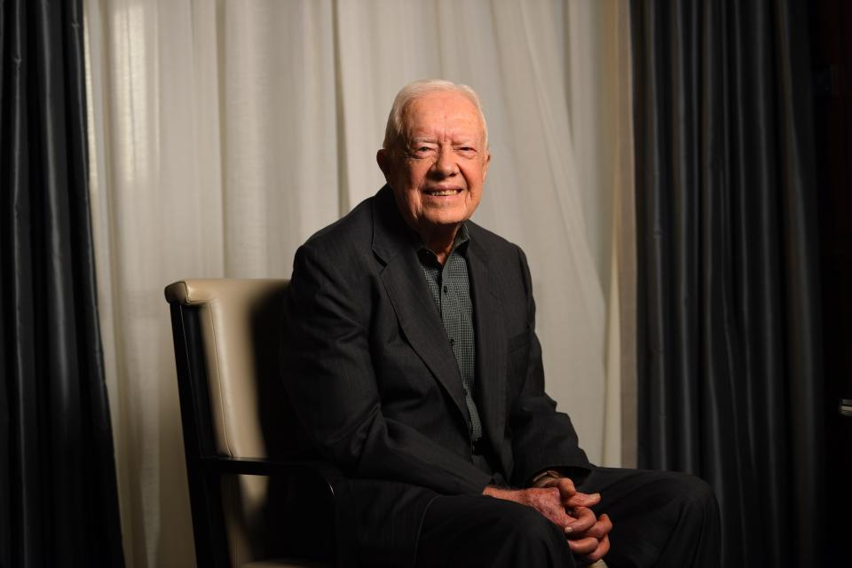Jimmy Carter sits for a portrait at the Peninsula Hotel in New York on March 26, 2018. The former U.S. president has entered hospice care at age 98, his charity said Saturday.