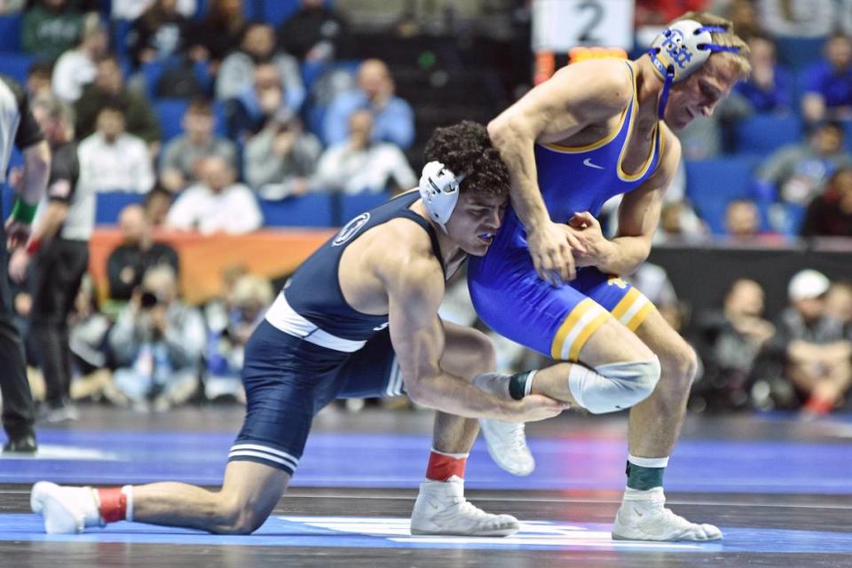 Penn State’s Beau Bartlett looks for a takedown on Pittsburgh’s Cole Matthews in their 141-pound quarterfinals match of the NCAA Championships on Friday, March 17, 2023 at the BOK Center in Tulsa, Okla.