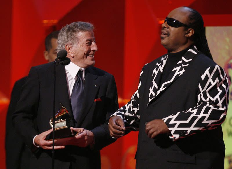 Tony Bennett and Stevie Wonder accept the Grammy for Best Pop Collaboration With Vocals at the 49th Annual Grammy Awards in Los Angeles