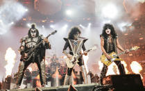 Gene Simmons, left, Tommy Thayer and Paul Stanley of KISS perform during the final night of the "Kiss Farewell Tour" on Saturday, Dec. 2, 2023, at Madison Square Garden in New York. (Photo by Evan Agostini/Invision/AP)