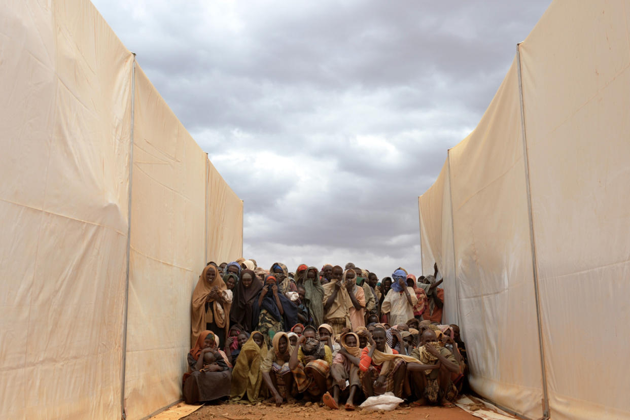 Somali refugees wait to be called to collect food aid (file image): AFP/Getty Images