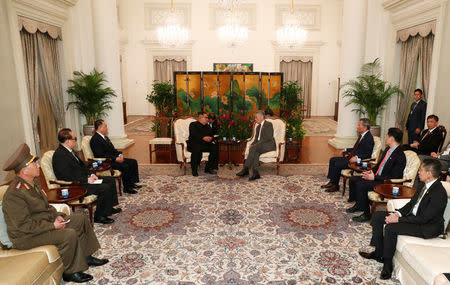 North Korea's leader Kim Jong Un meets with Singapore's Prime Minister Lee Hsien Loong at the Istana in Singapore June 10, 2018. REUTERS/Edgar Su