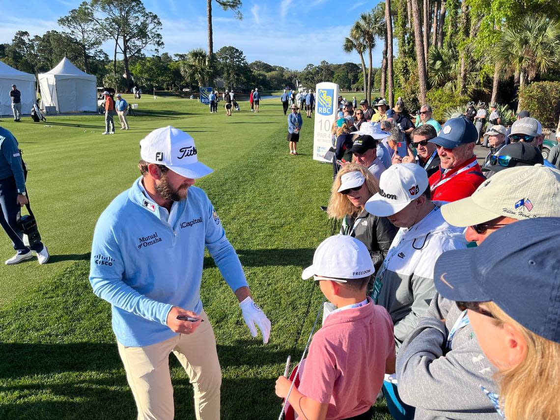 World No. 13 Cameron Young signs a few autographs at the 10th tee during the RBC Heritage Pro-Am.