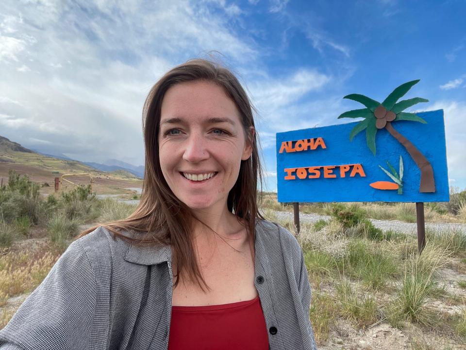 The author at the entrance to Iosepa, a ghost town outside of Salt Lake City, Utah.