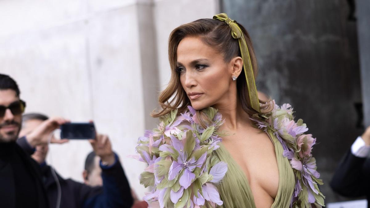 Jennifer Lopez Stuns in a Flower-Adorned Plunge Dress at Elie