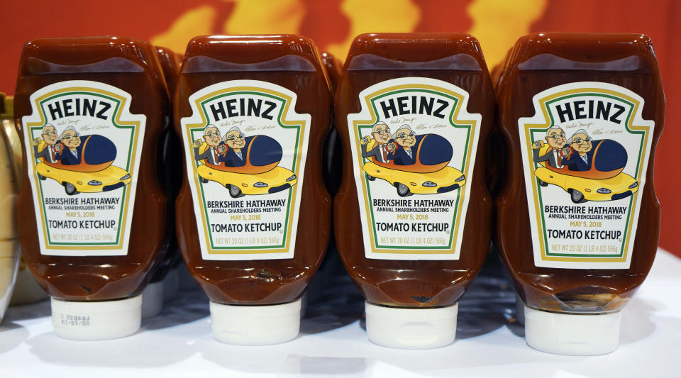 Bottles of Heinz tomato ketchup bear a special Berkshire Hathaway label as they are offered for sale to shareholders on the exhibit floor at the CenturyLink Center in Omaha, Neb., Friday, May 4, 2018, where Berkshire brands display their products and services. On Saturday, shareholders are expected to fill the CenturyLink arena as they attend the annual Berkshire Hathaway shareholders meeting where Buffett and his Vice Chairman Charlie Munger preside over a Q&A session. (AP Photo/Nati Harnik)