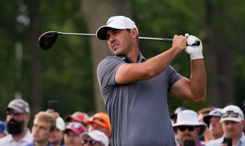 May 20, 2022; Tulsa, OK, USA; Brooks Koepka plays his shot on the 13th tee during the second round of the PGA Championship golf tournament at Southern Hills Country Club. Mandatory Credit: Michael Madrid-USA TODAY Sports