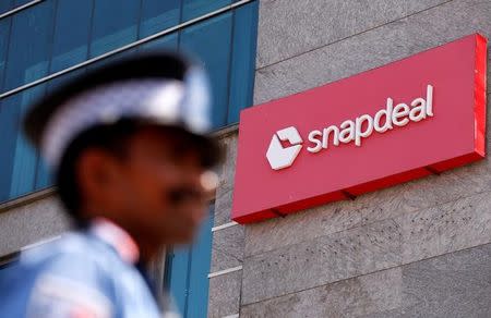 A private security gurad stands at a gate of Snapdeal headquarters in Gurugram on the outskirts of New Delhi, April 3, 2017. REUTERS/Adnan Abidi