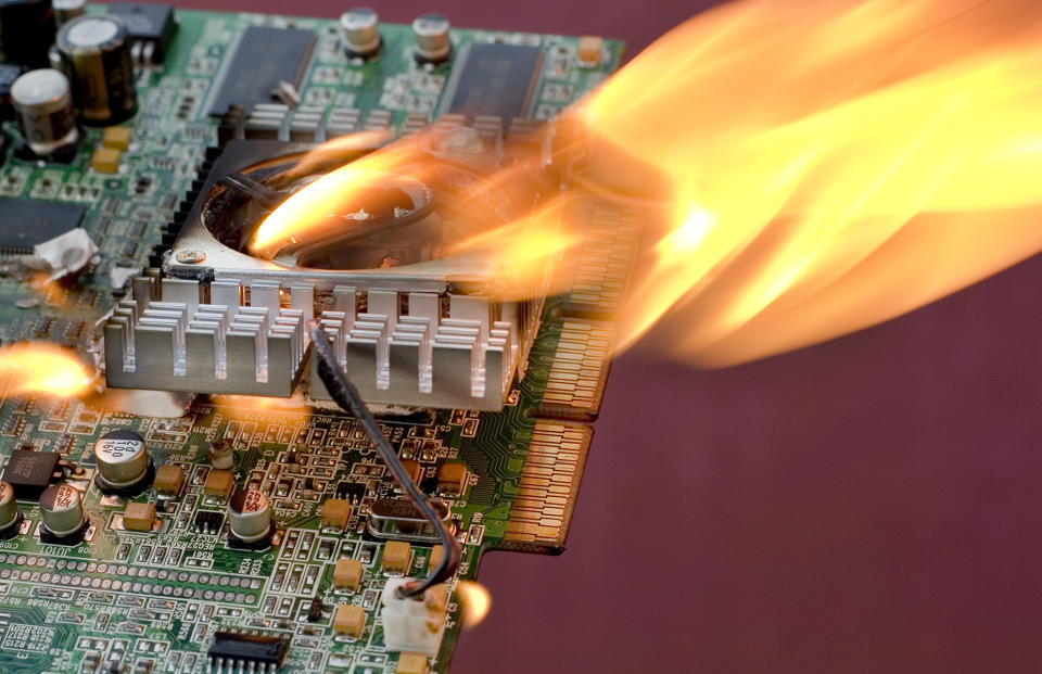 Close-up of a circuit board on fire