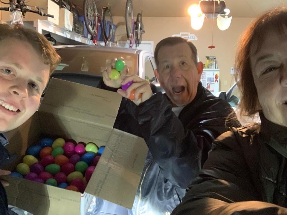 Friends of John Glenn Music advisors and volunteers Michael, Tom and Kathy Russell prepare to distribute candy-filled eggs during the organization's 2023 Egg My Yard Easter fundraiser.