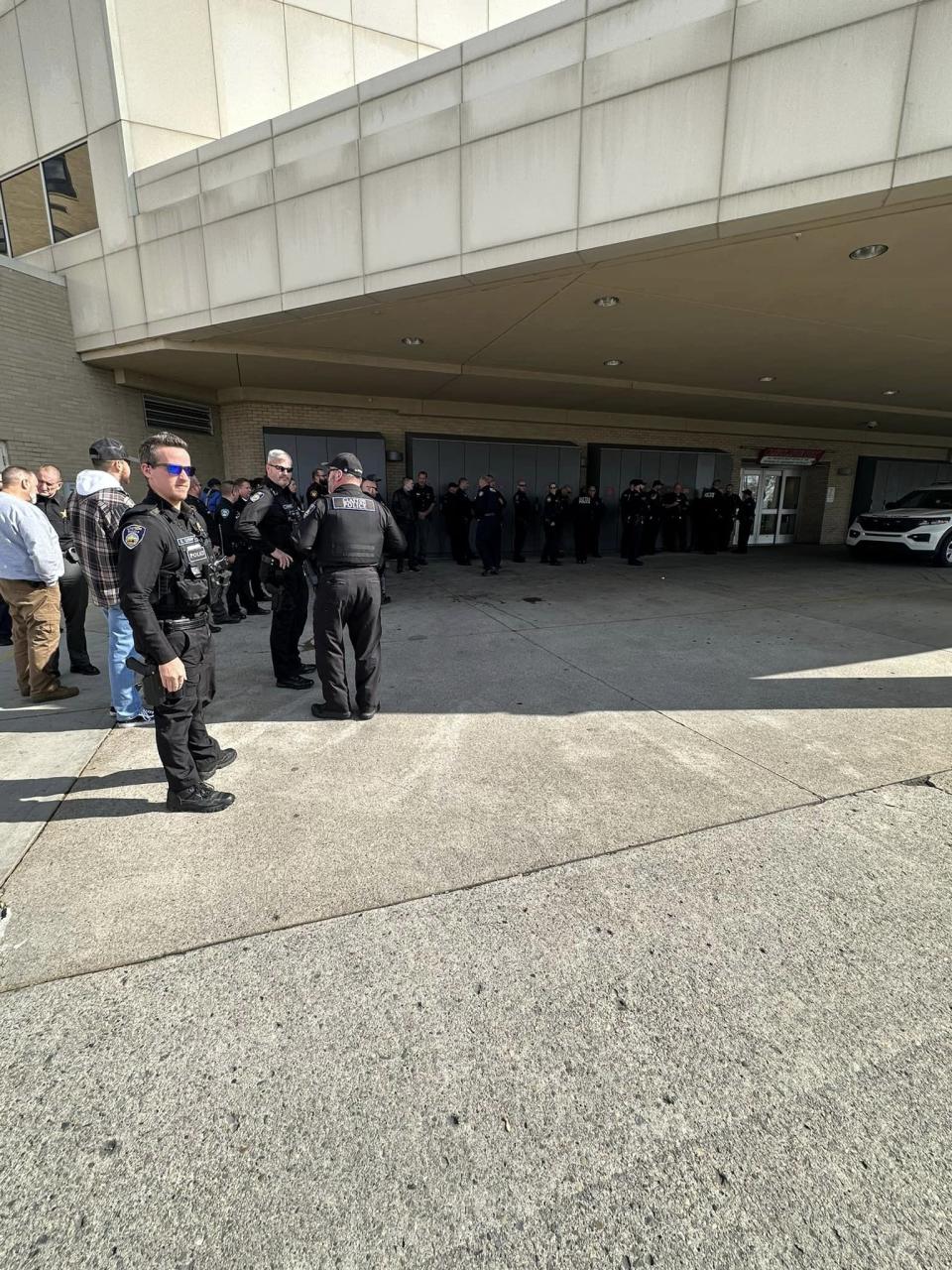 Dozens of officers and state troopers from across several cities in Montgomery and Greene counties gathered outside Miami Valley Hospital Tuesday as Officer Cody Cecil was released from Miami Valley Hospital five days after he was shot while serving a warrant in Clayton.