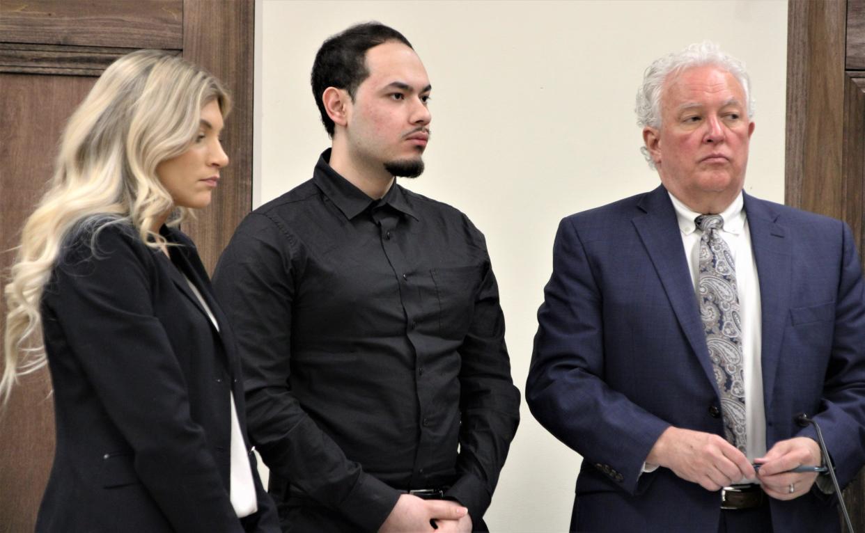 Christian Gutierrez, center, prepares to enter a guilty plea to aggravated murder during a hearing on Friday, March 17, 2023, in Marion County Common Pleas Court. Gutierrez pleaded guilty to one count of aggravated murder and was sentenced to life in prison with the possibility of parole after 28 years. Also pictured are Gutierrez's attorneys Kandra Roberts, left, and Kirk McVay.