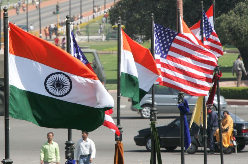 Indian and US national flags flutter ahead of visit US President Bush in New Delhi