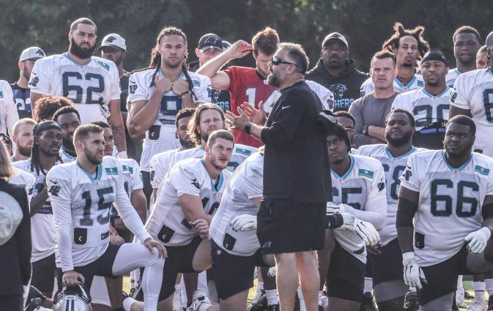 Carolina Panthers coach Matt Rhule speaks to players before day 5 of the Carolina Panthers training camp at Wofford College in Spartanburg, S.C., on Monday, August 2, 2021.