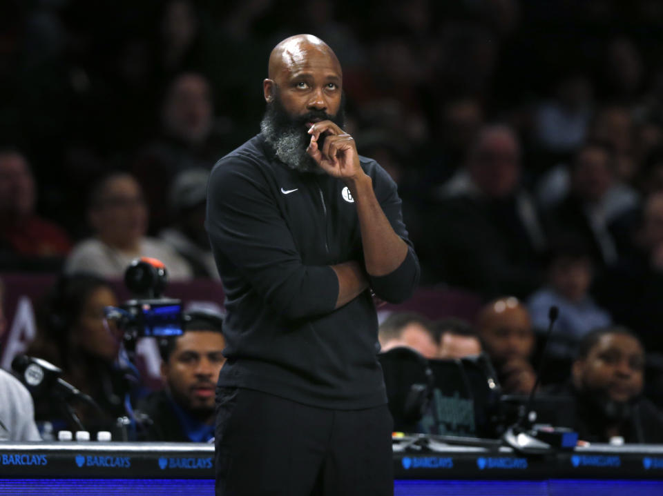 Brooklyn Nets coach Jacque Vaughn watches during the first half of the team's NBA basketball game against the Cleveland Cavaliers, Thursday, Feb. 8, 2024, in New York. (AP Photo/John Munson)