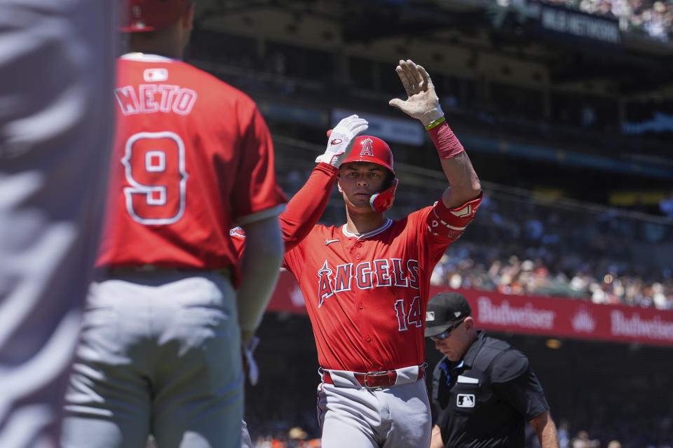 Los Angeles Angels' Logan O'Hoppe, right, celebrates with teammates after hitting a two-run home run against the San Francisco Giants during the sixth inning of a baseball game Saturday, June 15, 2024, in San Francisco. (AP Photo/Godofredo A. Vásquez)