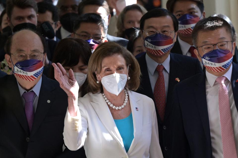 August 3, 2022: U.S. House Speaker Nancy Pelosi waves to journalists during her arrival at the Parliament in Taipei, Taiwan.