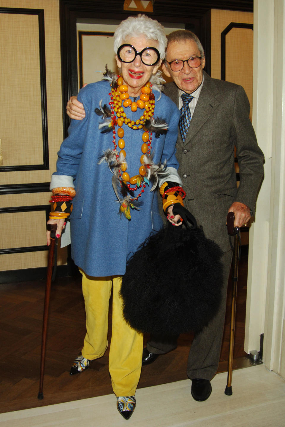 Iris Apfel and Carl Apfel at Bergdorf Goodman's Moschino dinner in honor of Rossella Jardini on Oct. 19, 2006 in New York City. (Joe Schildhorn/Patrick McMullan via Getty Images)