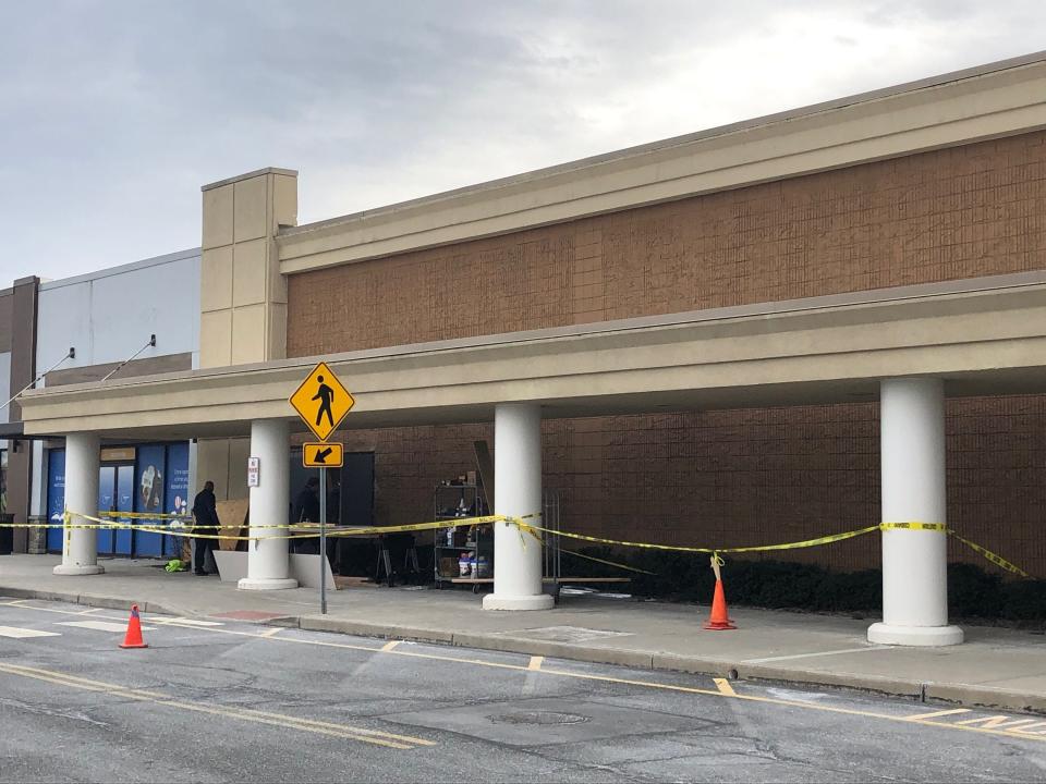 Yellow caution tape surrounds part of the Kohl's on Route 10 in Morris Plains Wednesday, March 22, 2023, a week after a car crashed into the building.