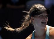 Eugenie Bouchard of Canada reacts during her women's quarter-final tennis match against Ana Ivanovic of Serbia at the Australian Open 2014 tennis tournament in Melbourne January 21, 2014. REUTERS/Jason Reed (AUSTRALIA - Tags: SPORT TENNIS TPX IMAGES OF THE DAY)