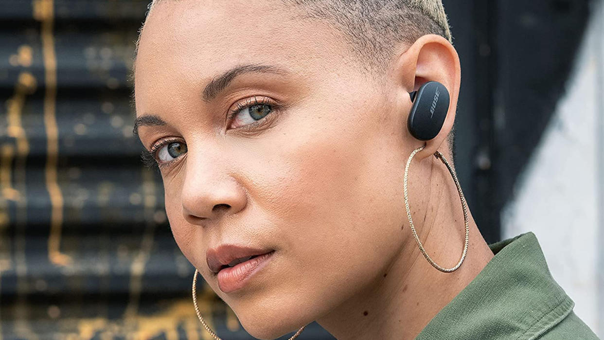 Bose QuietComfort Noise Canceling Earbuds in a woman's ears