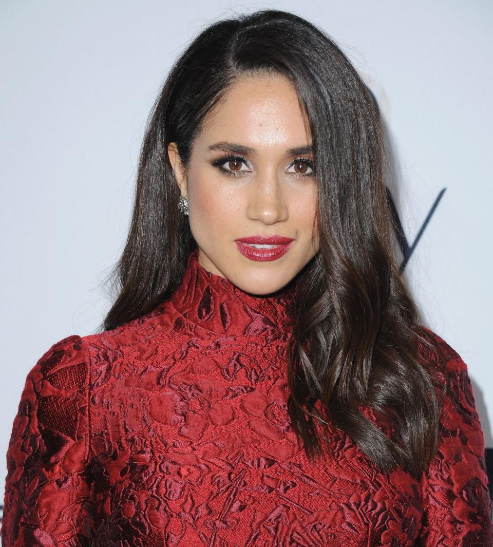 Meghan wearing dark red lipstick in 2016