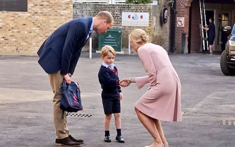 Prince George meets his headteacher at Thomas's Battersea - Credit: Richard Pohle/The Times/PA Wire