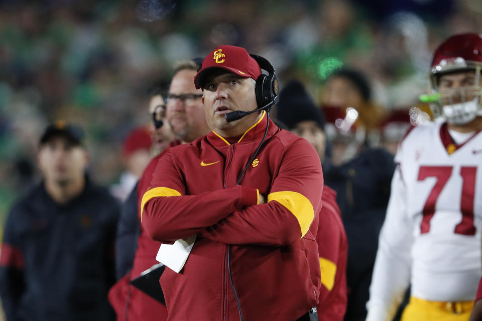 Southern California head coach Clay Helton watches against Notre Dame in the first half of an NCAA college football game in South Bend, Ind., Saturday, Oct. 12, 2019. (AP Photo/Paul Sancya)