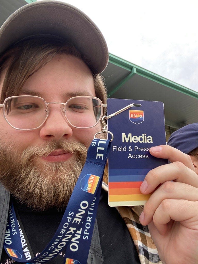 Reporter Keenan Thomas taking a selfie with his media pass given to him at the One Knoxville SC game against South Georgia Tormenta FC on April 21, 2023.