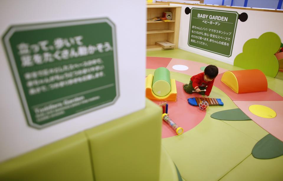 Two-year-old Sakuya Zui plays at an indoor playground which was built for children and parents who refrain from playing outside because of concerns about nuclear radiation in Koriyama, west of the tsunami-crippled Fukushima Daiichi nuclear power plant, Fukushima prefecture February 27, 2014. (REUTERS/Toru Hanai)