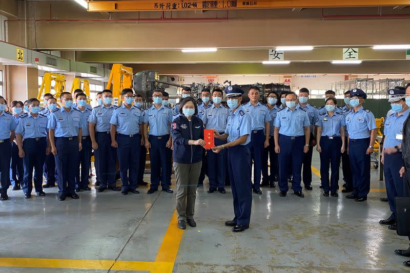 Taiwan's President Tsai Ing-wen visits an Air Force maintenance centre at the Gangshan air base in Kaohsiung, Taiwan