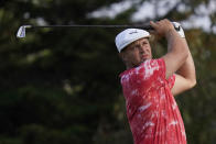 Bryson DeChambeau watches his tee shot on the 11th hole during the second round of the PGA Championship golf tournament at TPC Harding Park Friday, Aug. 7, 2020, in San Francisco. (AP Photo/Jeff Chiu)