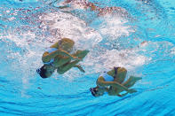 Anna Kulkina and Aigerim Zhexembinova of Kazakhstan compete in the Women's Duets Synchronised Swimming Free Routine Preliminary on Day 10 of the London 2012 Olympic Games at the Aquatics Centre on August 6, 2012 in London, England. (Photo by Clive Rose/Getty Images)