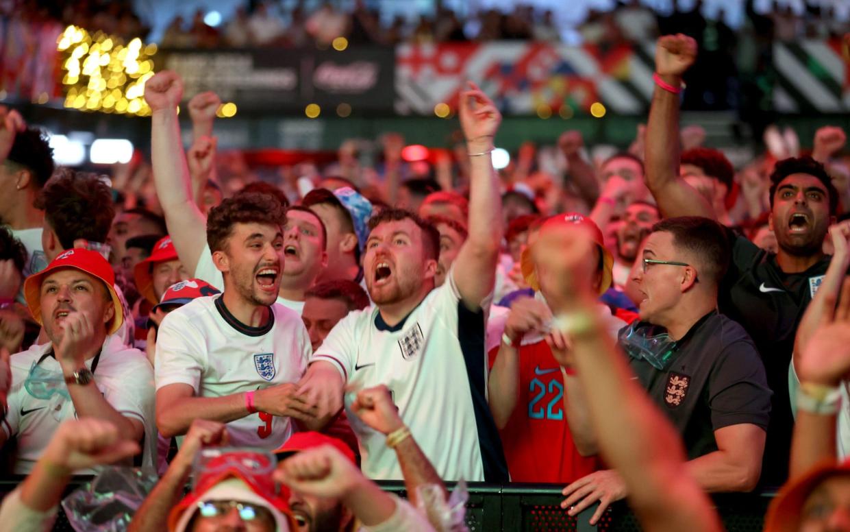 England fans at Boxpark Wembley react to the equalising goal from England's Cole Palmer