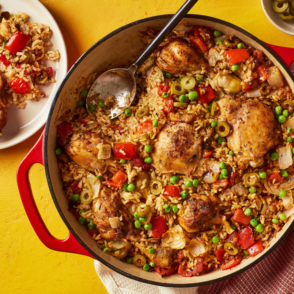 <p>Juicy cuts of chicken get cooked alongside rice, onion, tomatoes and broth in this irresistible one-pot dish that pulls inspiration from the Puerto Rican arroz con pollo. For added fiber, brown rice stands in for the white rice typically used. <a href="https://www.eatingwell.com/recipe/7992219/one-pot-arroz-con-pollo/" rel="nofollow noopener" target="_blank" data-ylk="slk:View Recipe;elm:context_link;itc:0;sec:content-canvas" class="link ">View Recipe</a></p>